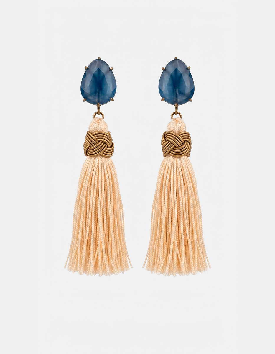 Aretes de plata en baño vermeil 22k con pompón y ojo de gato azul