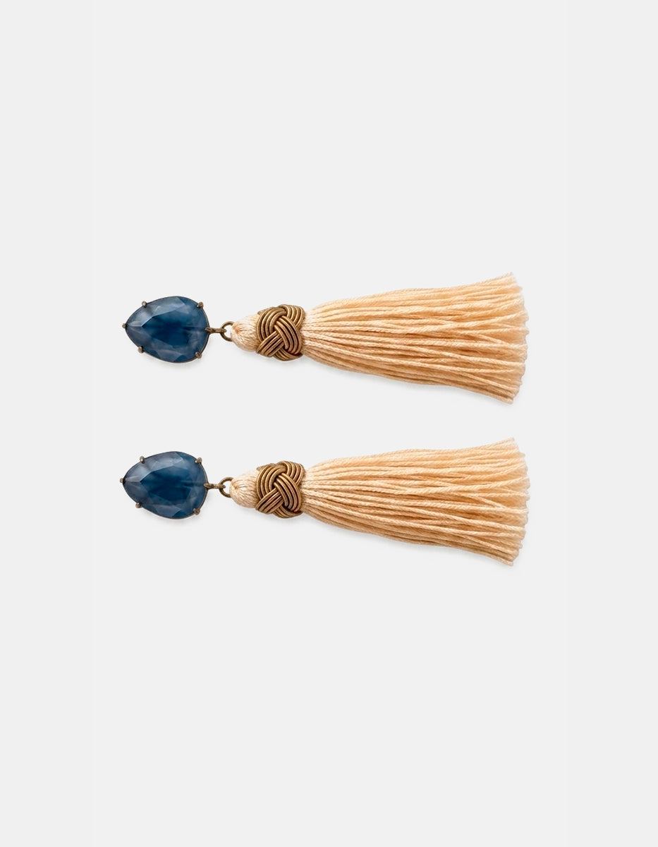 Aretes de plata en baño vermeil 22k con pompón y ojo de gato azul