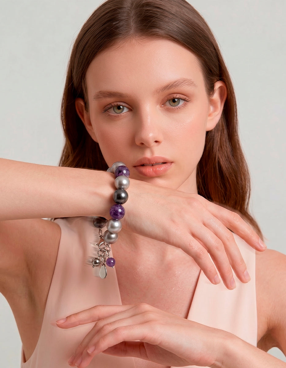 Pulsera de metal base con baño rodinado, amatista y hematita