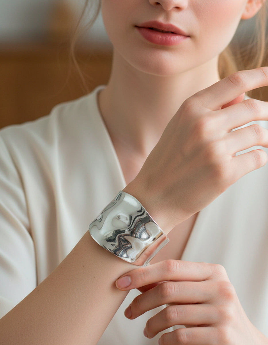 Brazalete de metal noble en baño de platino curve