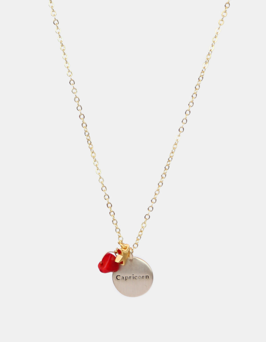 Collar de bronce con dije Capricornio en baño de oro laminado mate y topacios blancos Zodiac
