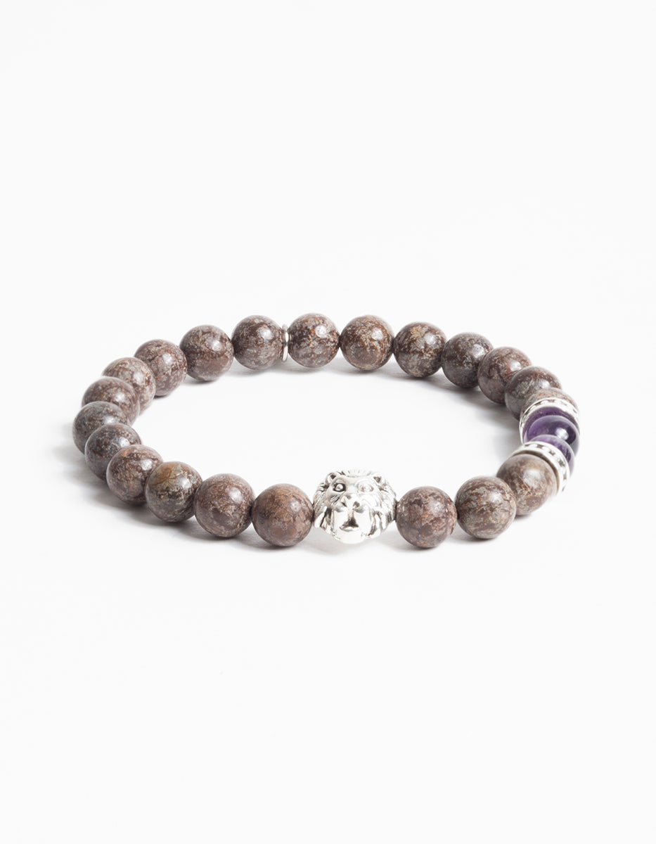 Pulsera de bronce en baño de rodio con obsidiana copo de nieve roja y dije con cabeza de león Nordic