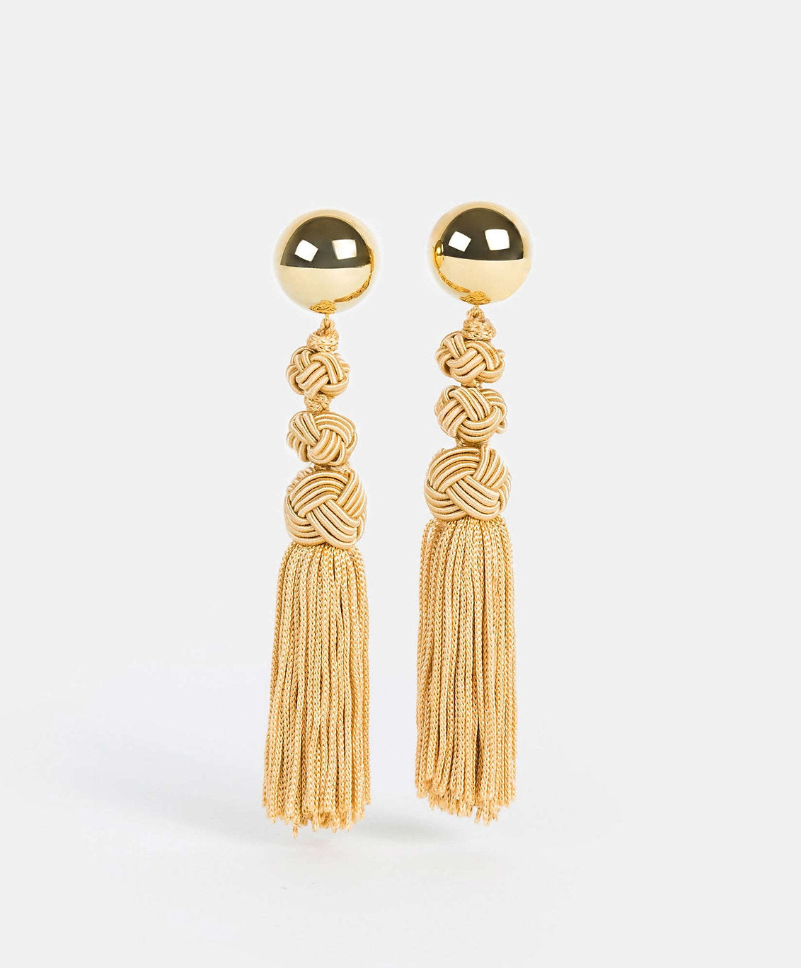 Aretes bronce baño de oro 22kt Mota Universe