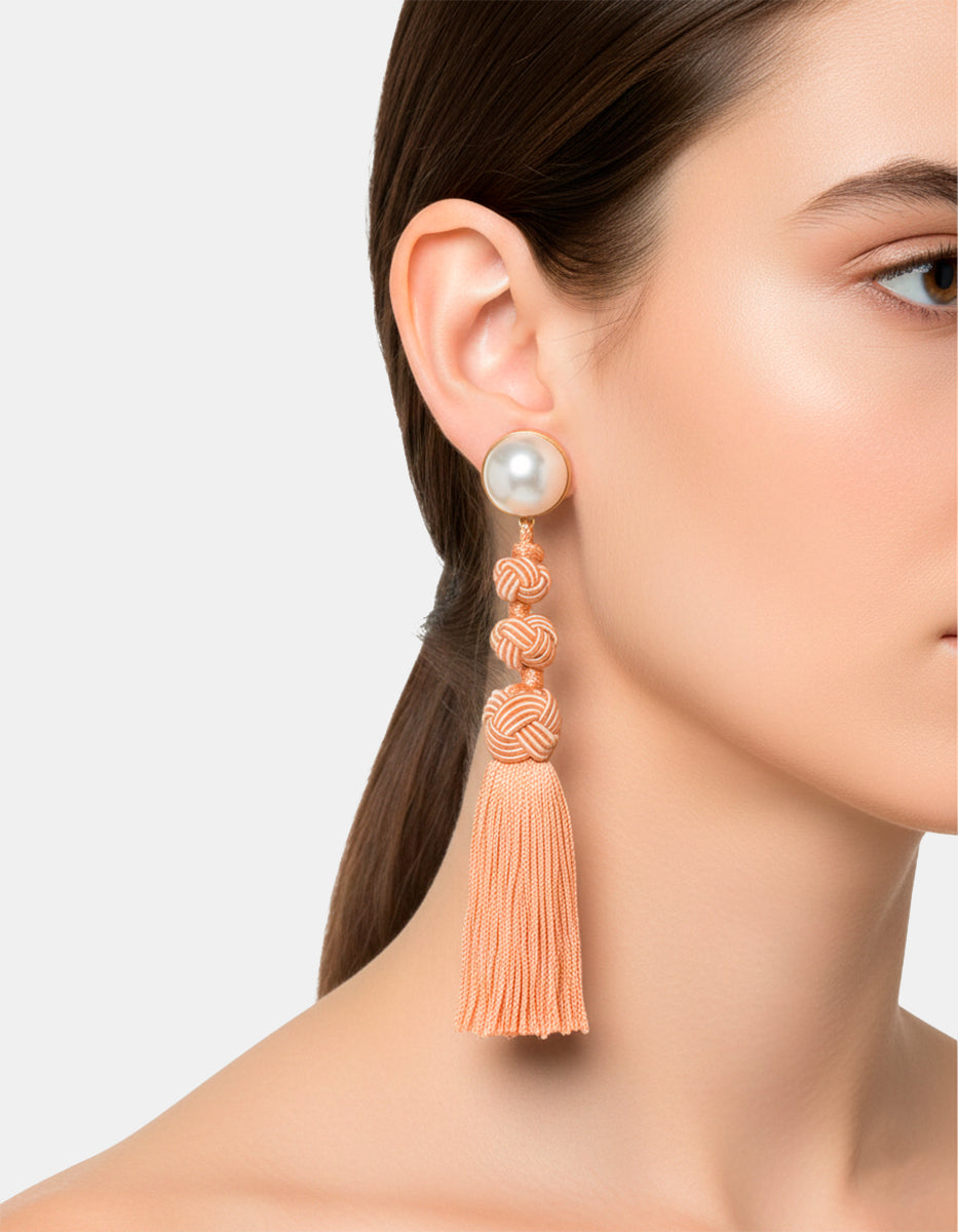 Aretes con perla mabe y pompones mamey