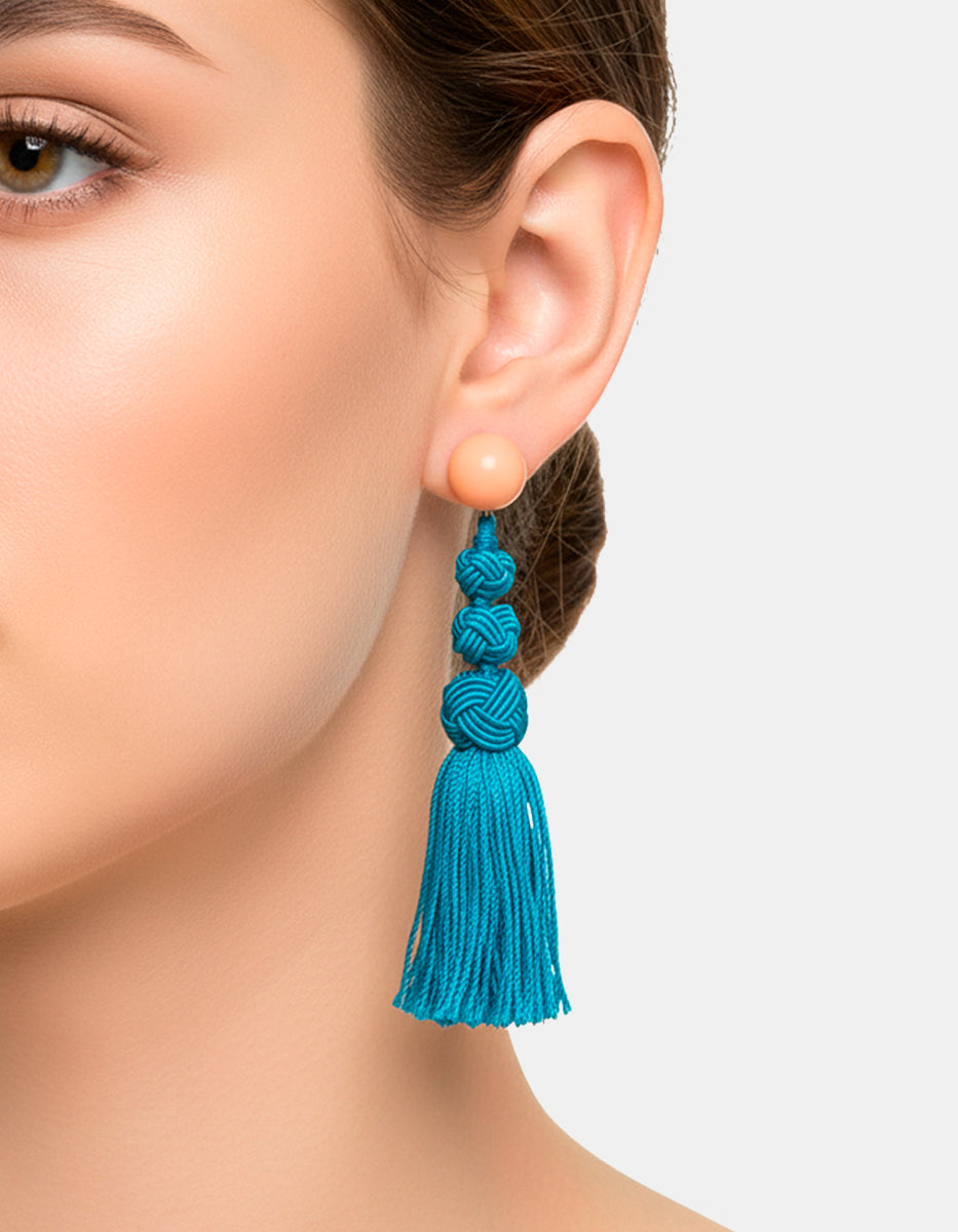 Aretes de bronce con baño de oro 22kt y borlas de hilo de seda Espléndida