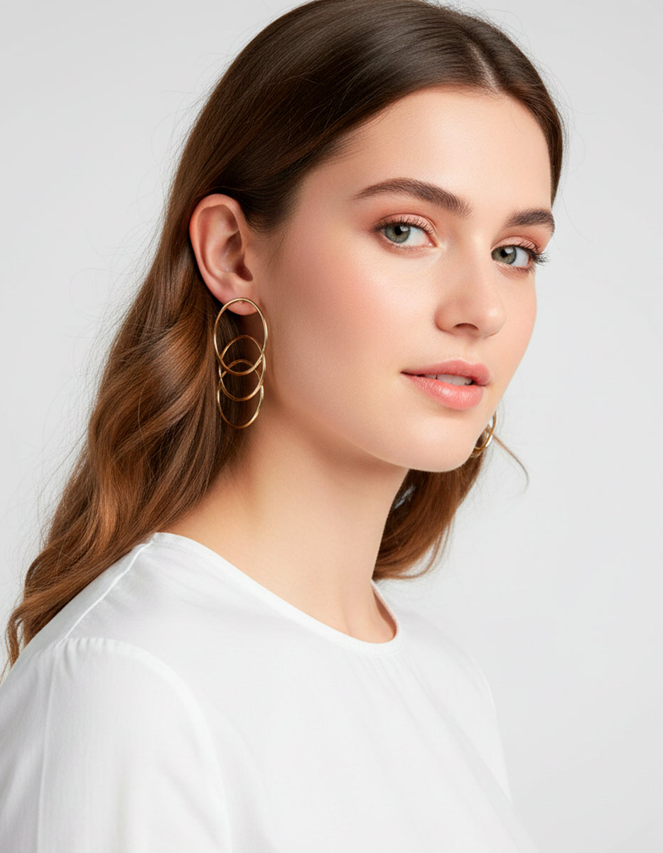 Aretes triple aro con baño oro 22kt Oui