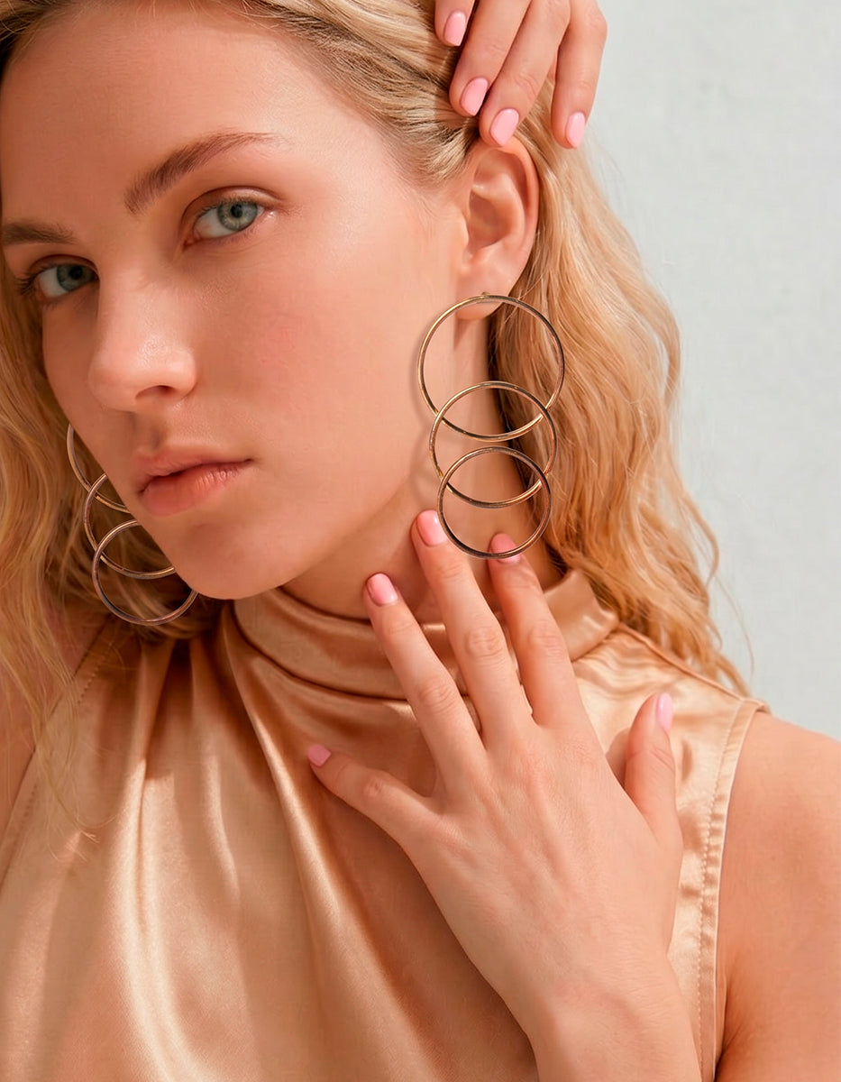 Aretes triple aro con baño oro 22kt Oui