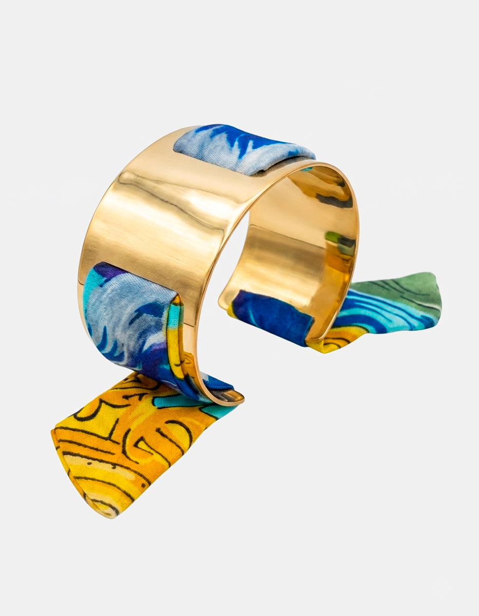 Brazalete de bronce en baño de oro 22k con detalle azul