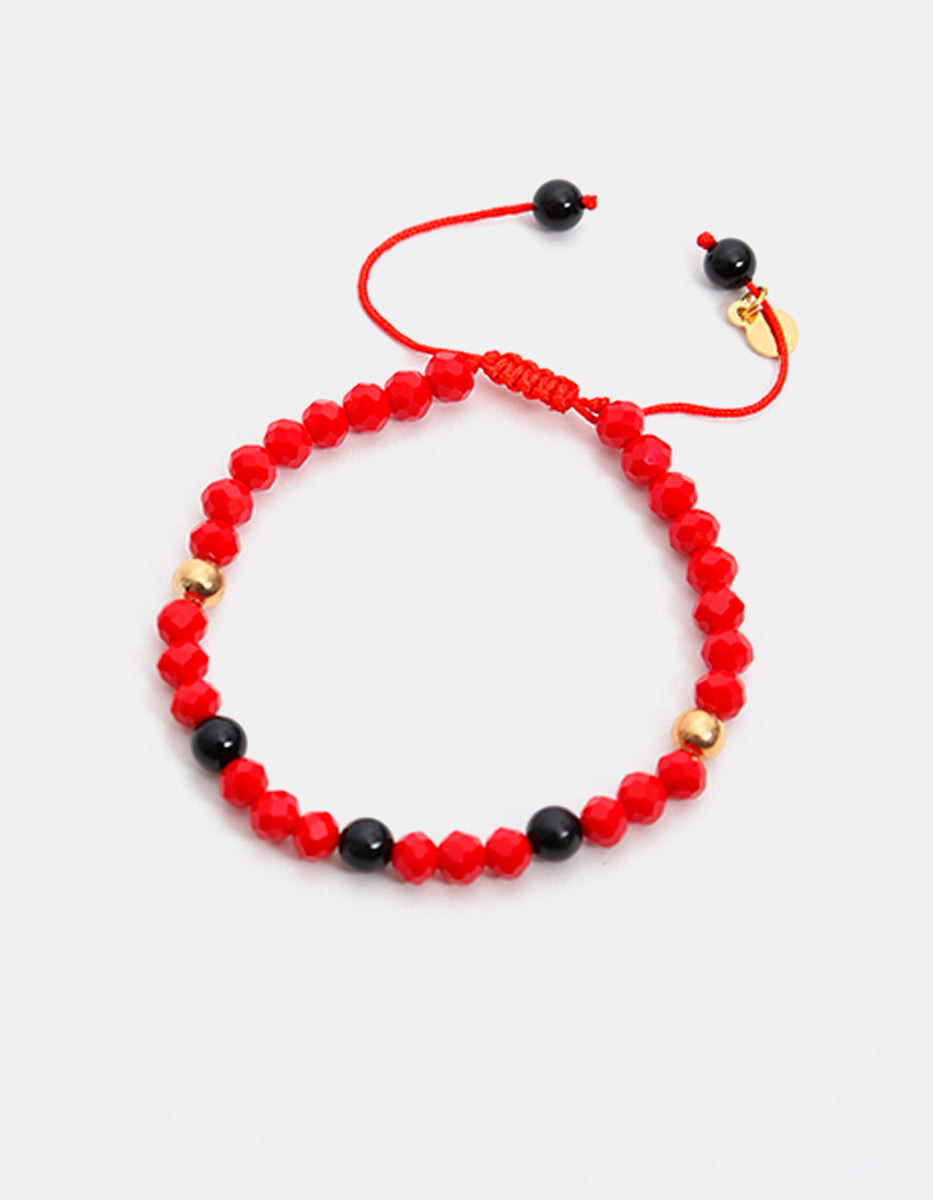 Pulsera de piedra acerina con separador de bronce en baño de oro 22 kt Nordic