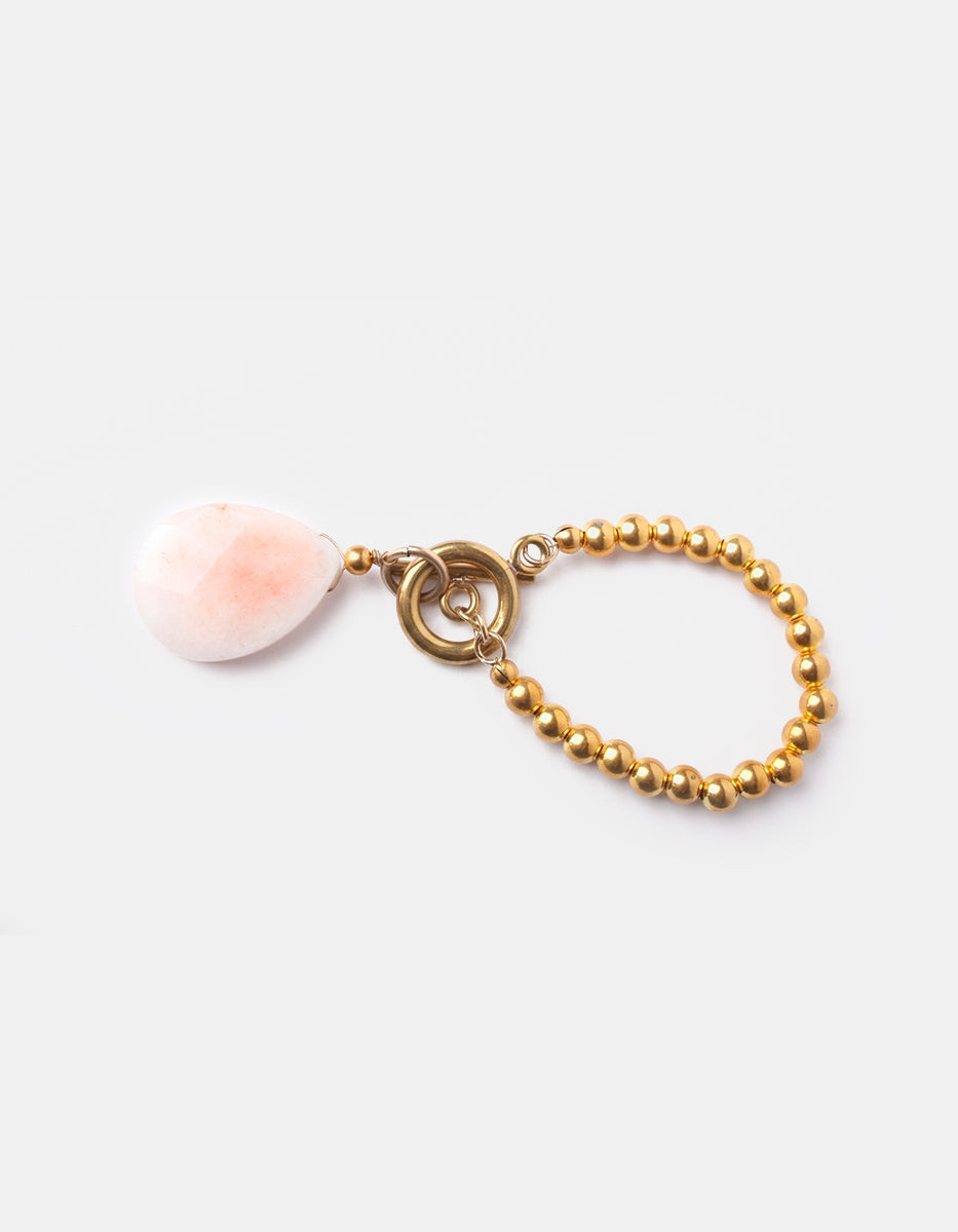Pulsera de Oro Laminado 22 kt con esferas Doradas y Cherry Quartz en Corte Gota