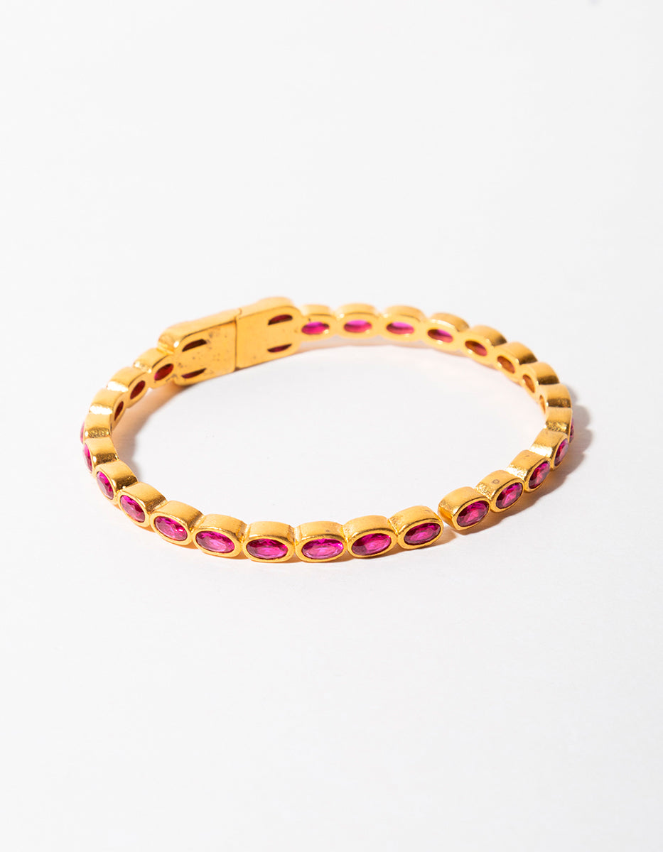 Brazalete con espinolitas fucsia Flashy