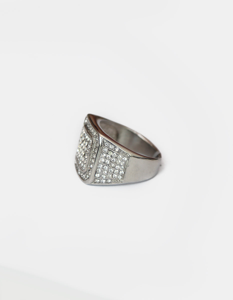 Anillo de acero inoxidable en baño de rodio con espinolitas en frente y costados Nordic