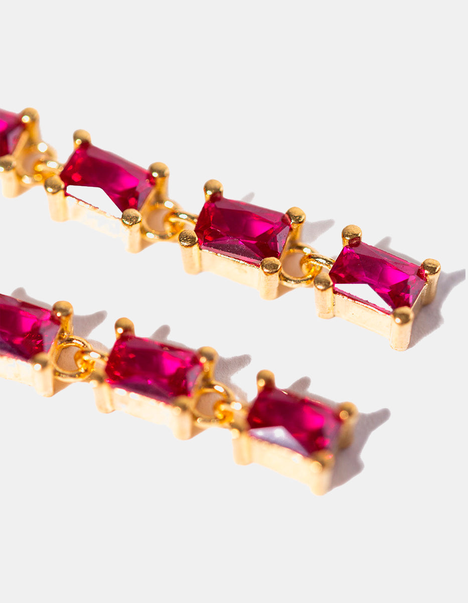 Aretes con espinolitas tono fucisa en cascada Flashy