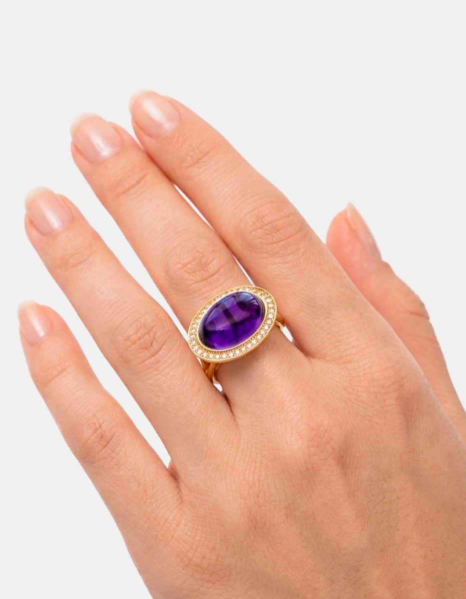 Anillo de plata .925 con baño vermeil de 22k y zafiro azul en forma de óvalo talla 7