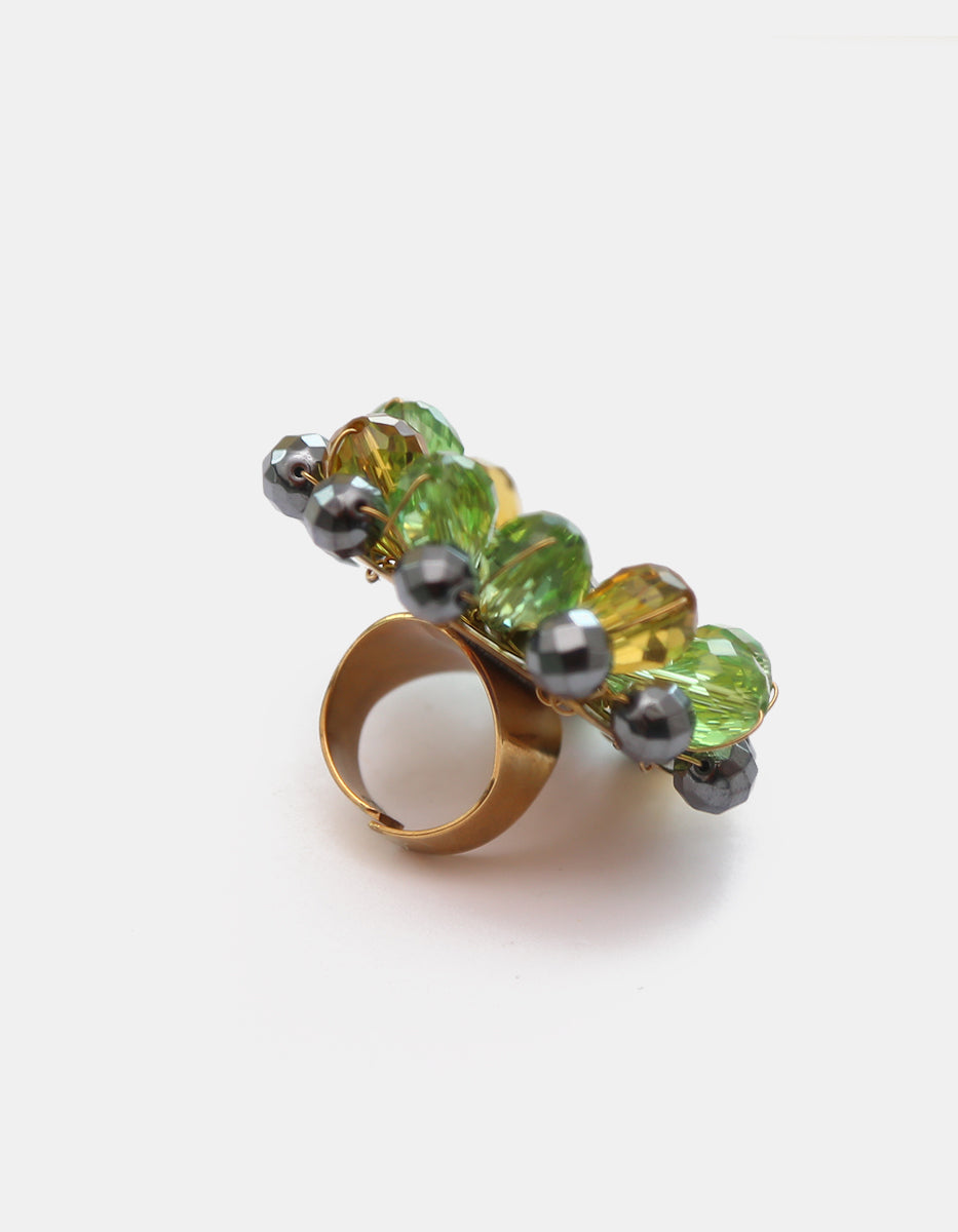 Anillo ajustable en baño vermeil de 22k con flor de circonias en tonos verde y ámbar