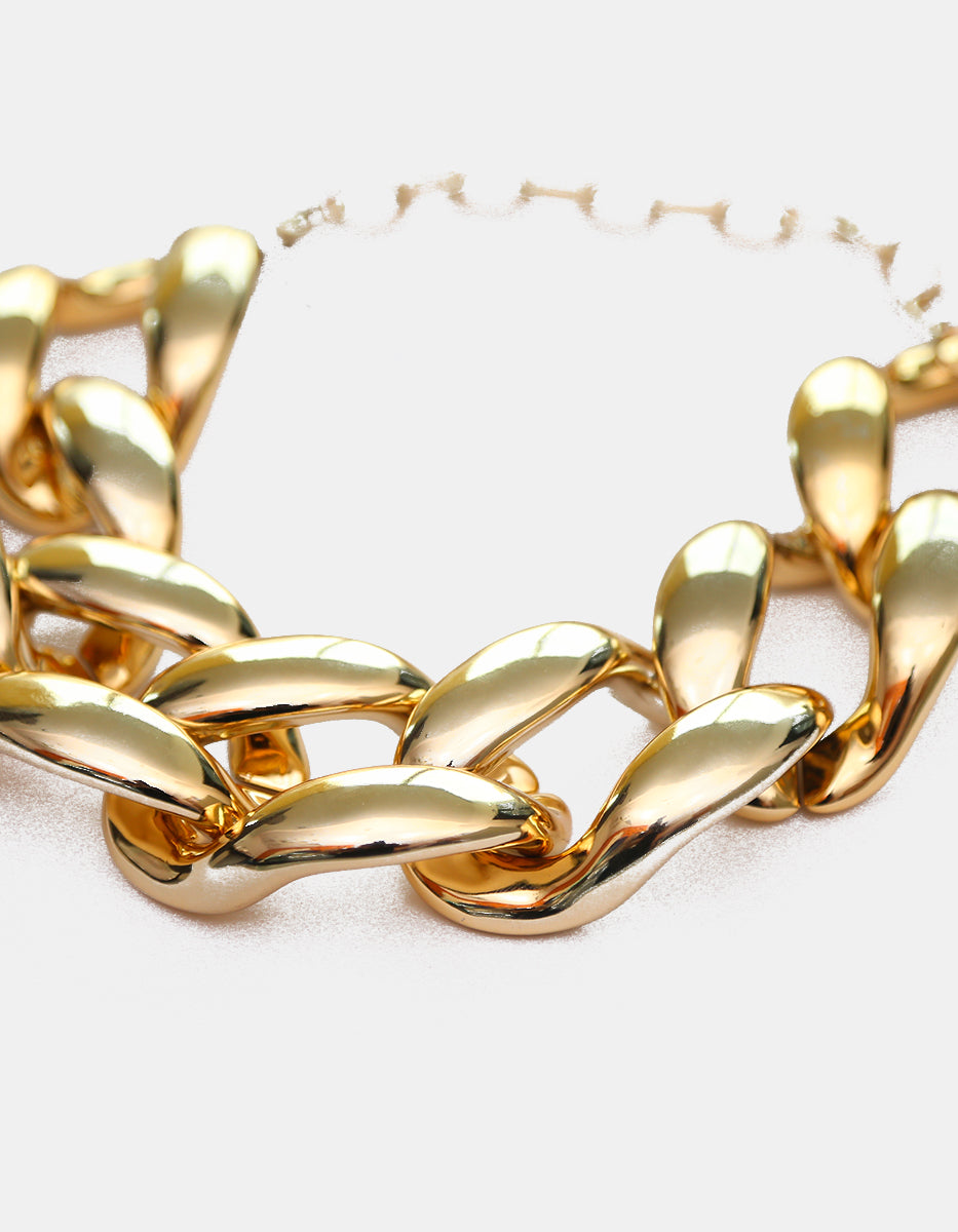 Collar de eslabones acrílicos dorados con cadena en bronce con baño de oro de 22kt