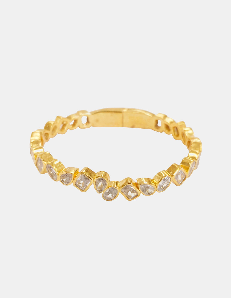 Brazalete de oro laminado 22k con topacios blancos en cortes multiples