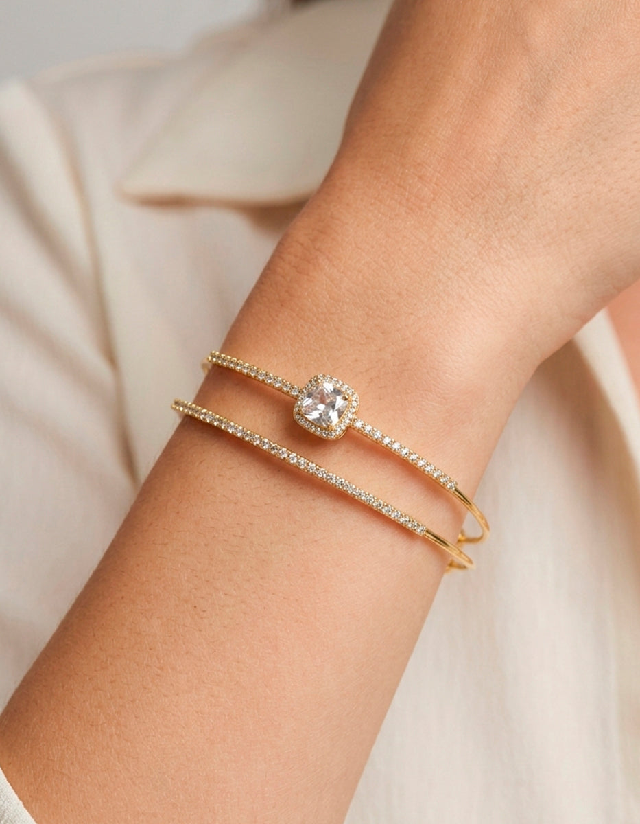 Brazalete con baño de oro 22 kt doble hilo con topacios blancos Festive Style