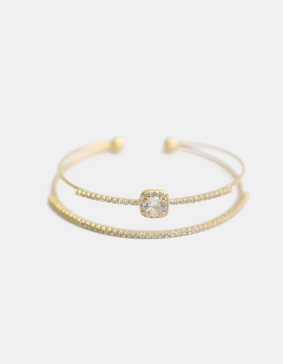 Brazalete con baño de oro 22 kt doble hilo con topacios blancos Festive Style