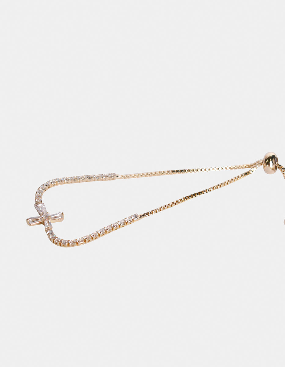 Pulsera ajustable con dije cruz mini y topacios blancos Festive Style