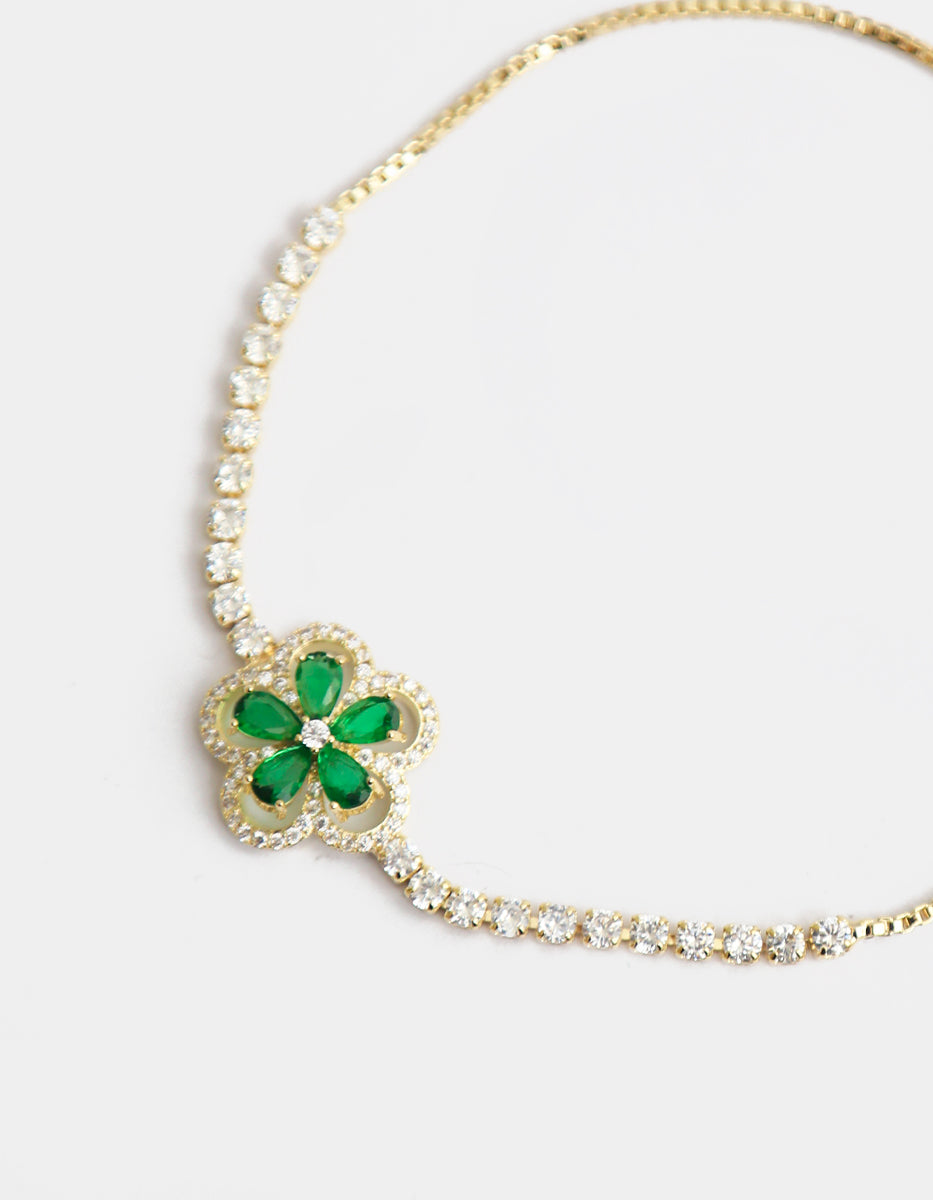 Pulsera ajustable en baño de oro de 22 kt con diseño de flor con esmeralda y topacios blancos