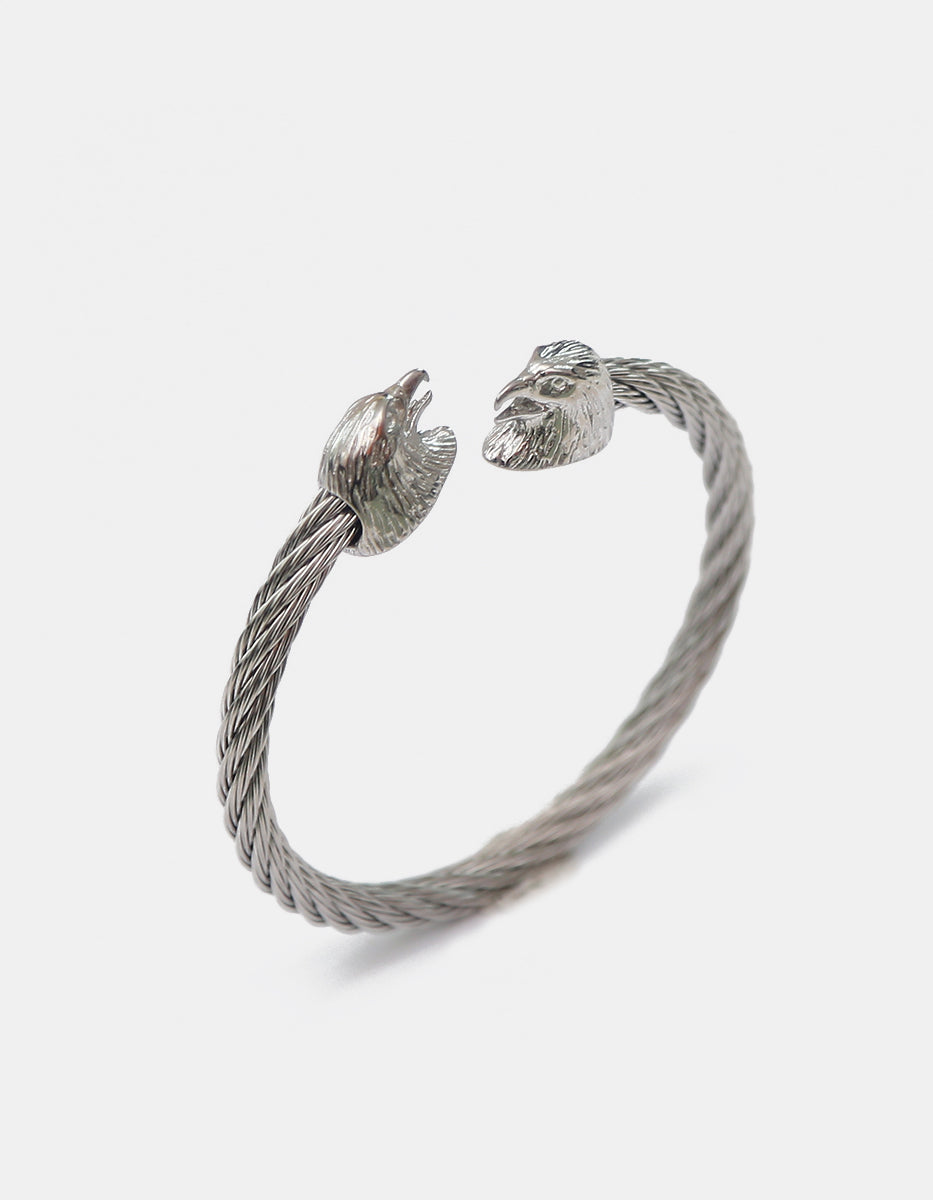 Brazalete torzado en baño Silver-filled con terminales de cabeza de águila