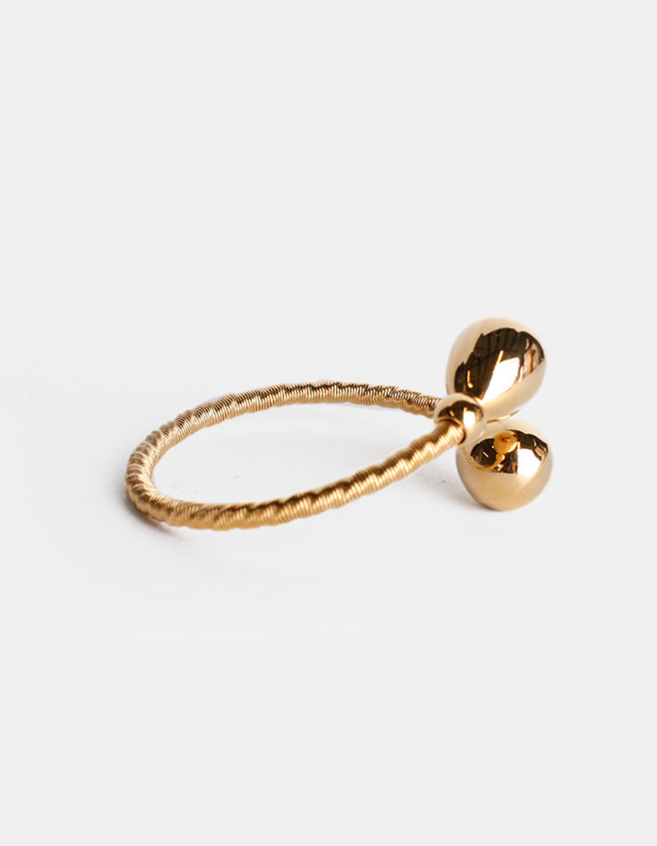 Brazalete de oro laminado con terminación en forma de gota Golden Chic