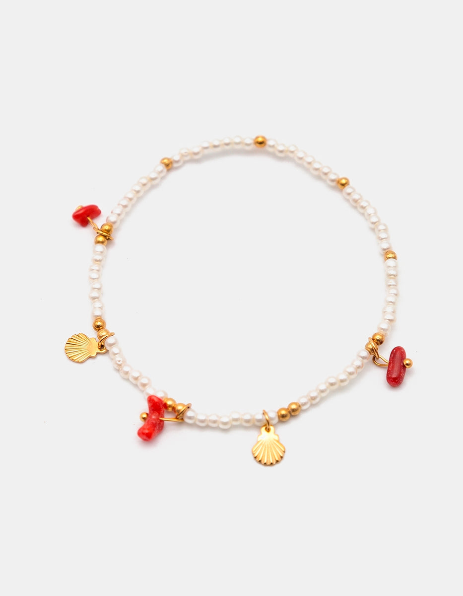 Pulsera de perlas con dijes de concha en Gold-Filled y acentos de baquelita roja Ultramar