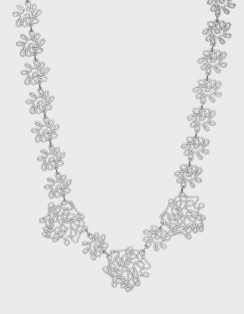 Collar con 4250 topacios blancos montados corte diamante Infinito Elite