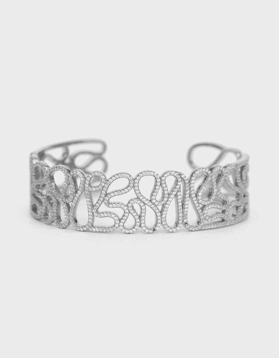 Brazalete delgado & 932 topacios blancos montados corte diamante Infinito Elite