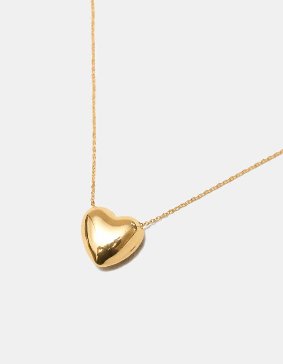 Collar en bronce con baño de oro 22 kt y dije en forma de corazón Love Story