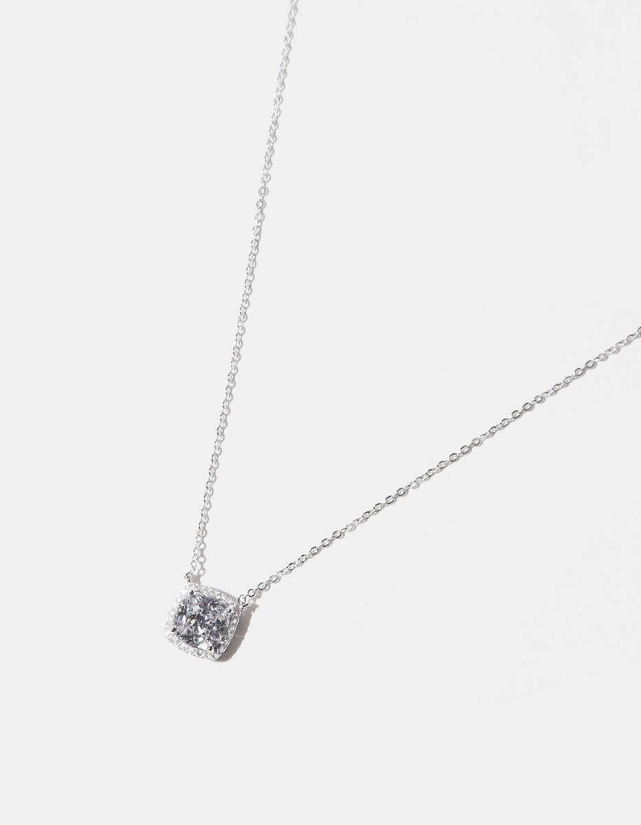 Colgante en Plata 925 bañados en Rodio Blanco con Topacios Blancos Sublime