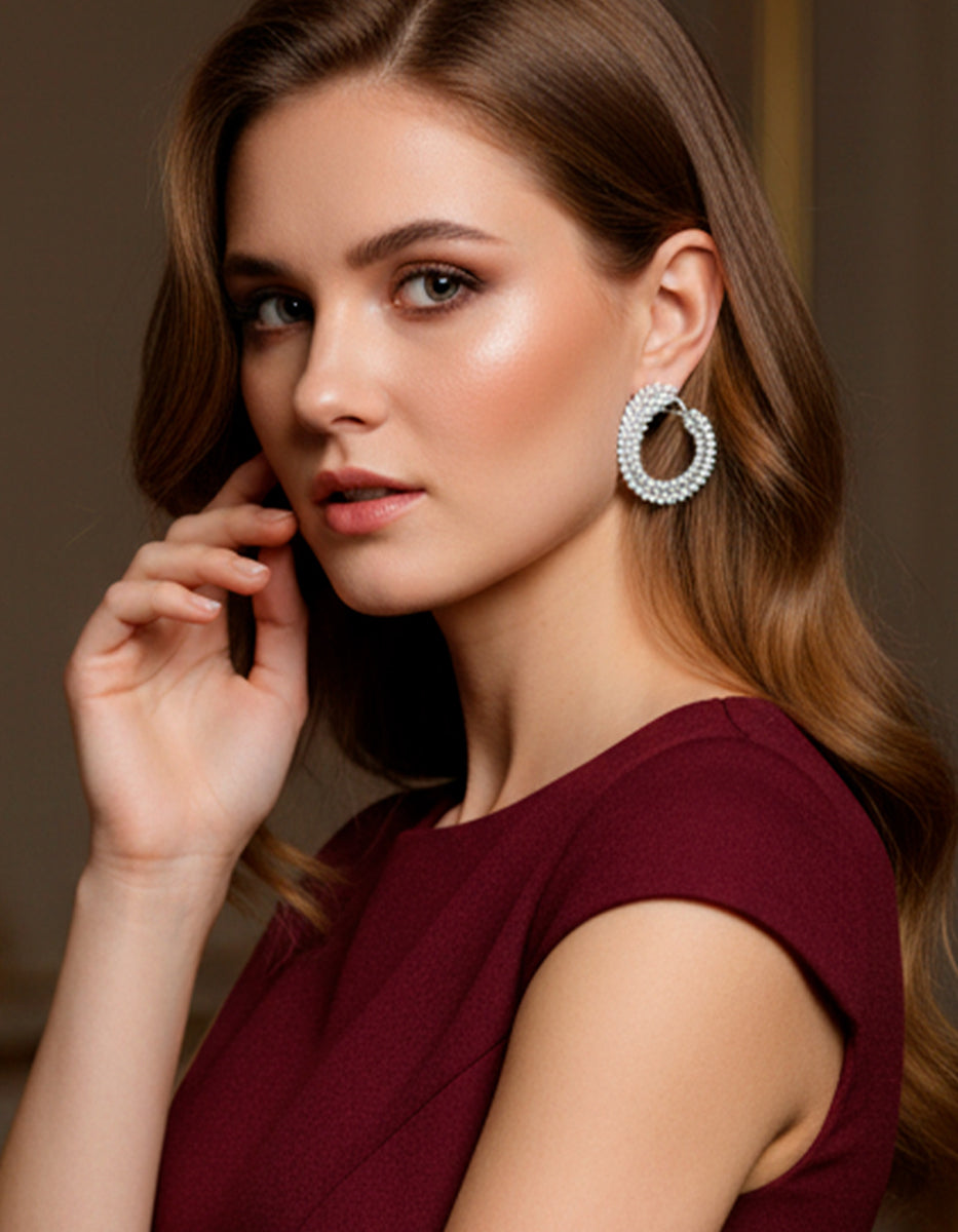 Aretes en Plata 925 bañados en Rodio Blanco con Topacios Blancos Sublime