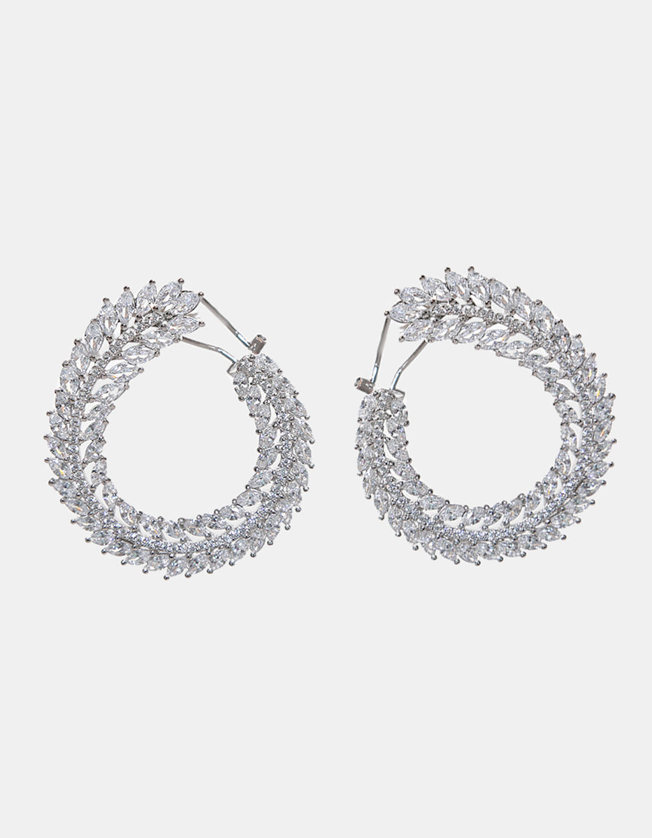 Aretes en Plata 925 bañados en Rodio Blanco con Topacios Blancos Sublime