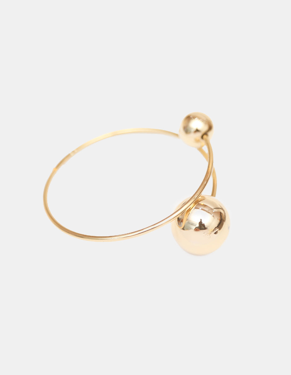 Brazalete de oro laminado 22k con diseño de doble esfera asimétrica y aro rígido Golden Chic
