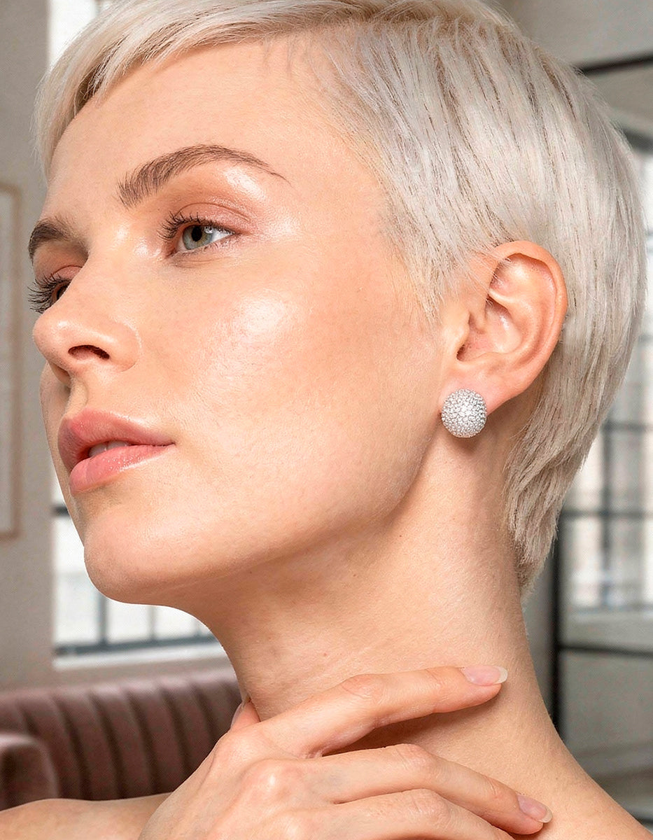Aretes con baño Platino e incrustaciones de topacios blancos corte brillante Festive Style