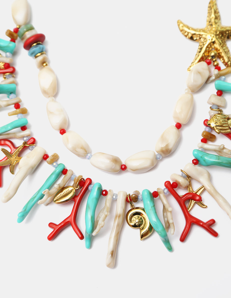 Collar en Baquelita Multicolor con Dijes de Estrella de Mar en Goldfilled de 22kt