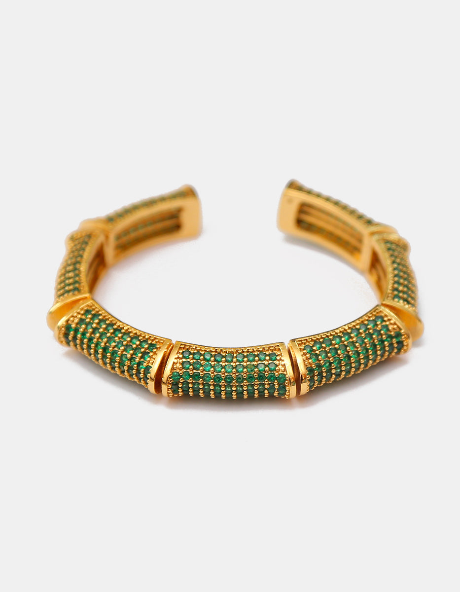 Brazalete de bronce en baño de oro con espinolitas de 1mm verde esmeralda en corte brillante