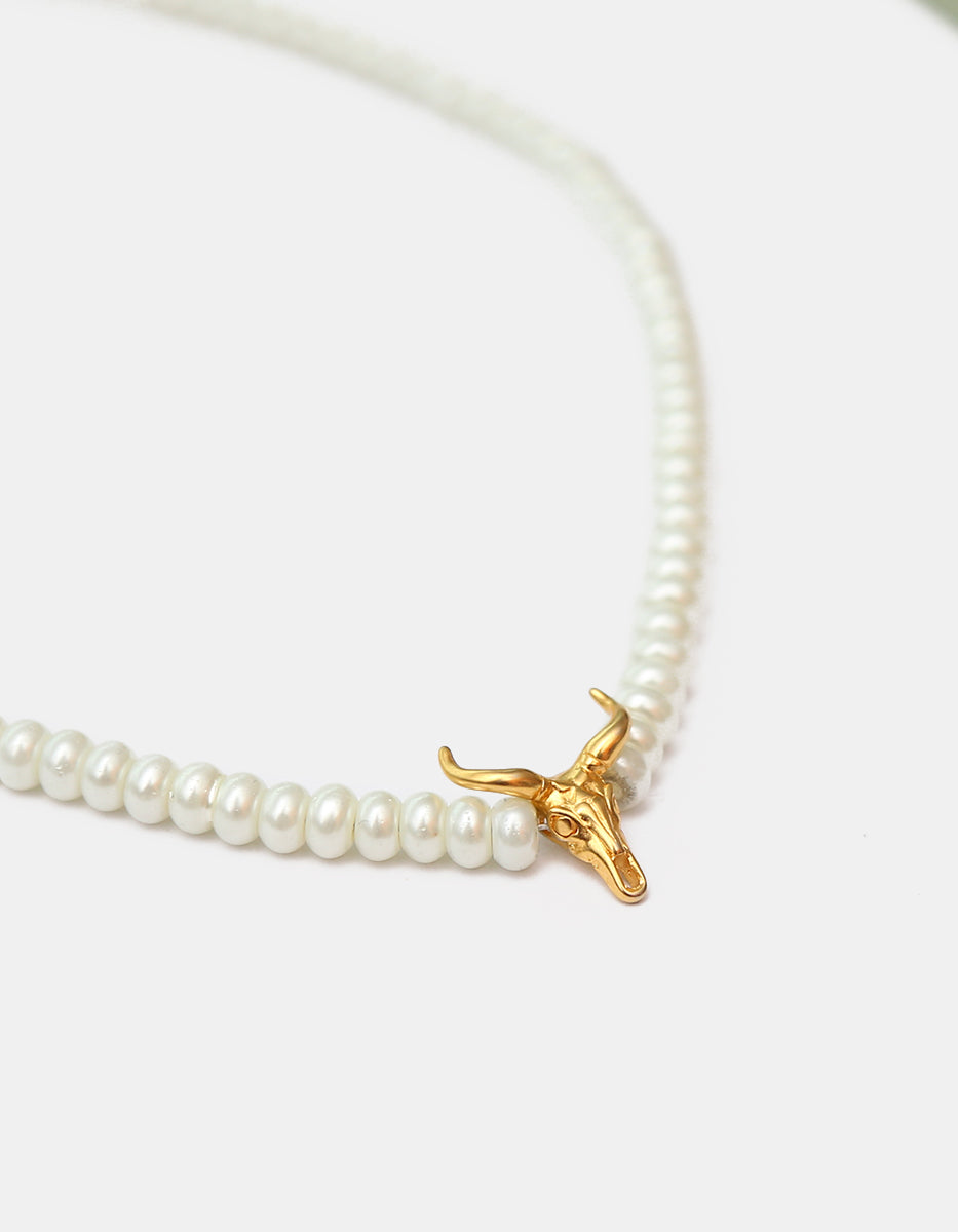 Collar en baño Vermeil de 22 kt con perla mabe y calavera del desierto Nordic