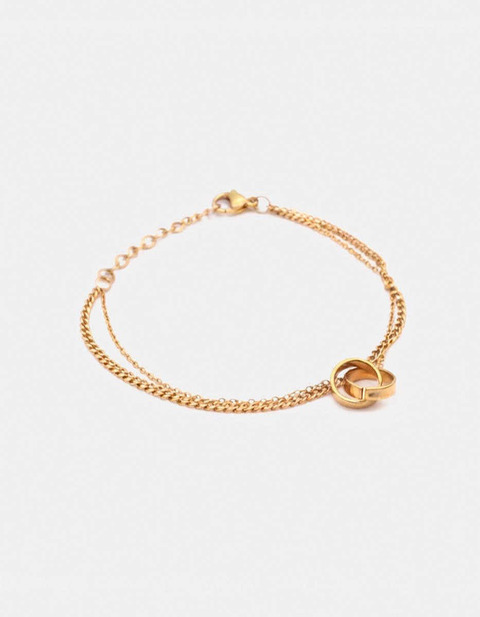 Pulsera de oro laminado 22kt con doble cadena y aros entrelazados Golden Chic
