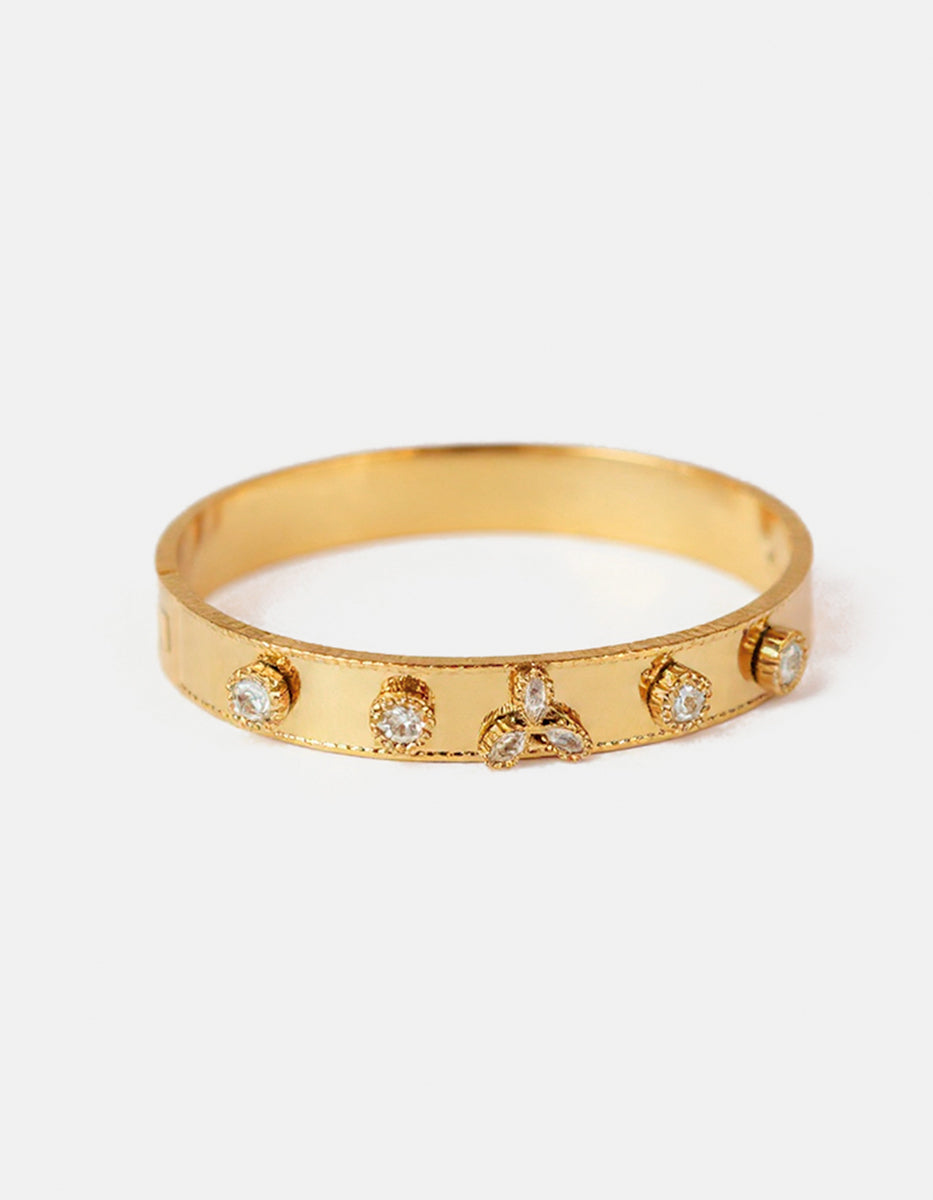 Brazalete de oro laminado estriado con topacios blancos Golden Chic