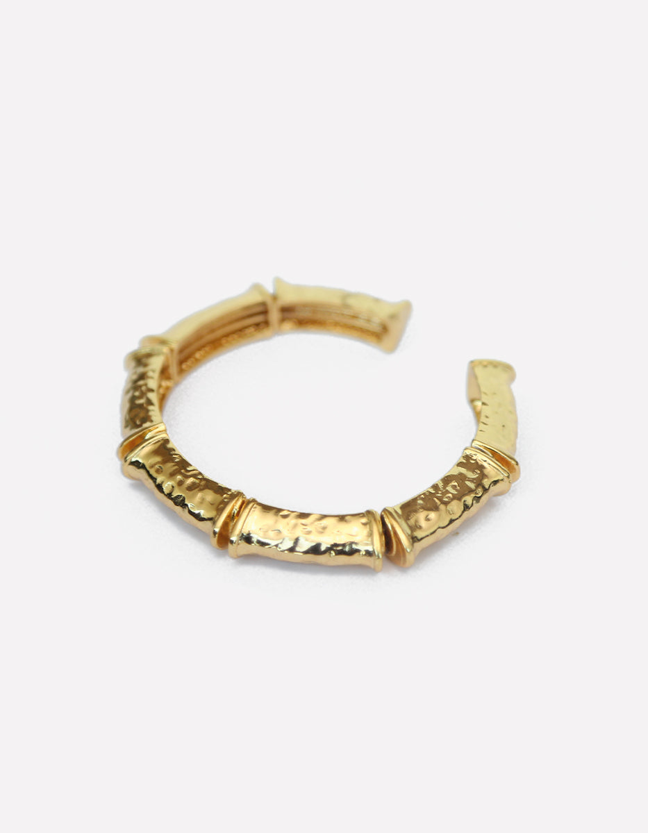 Brazalete de bronce con baño de oro 22k martillado