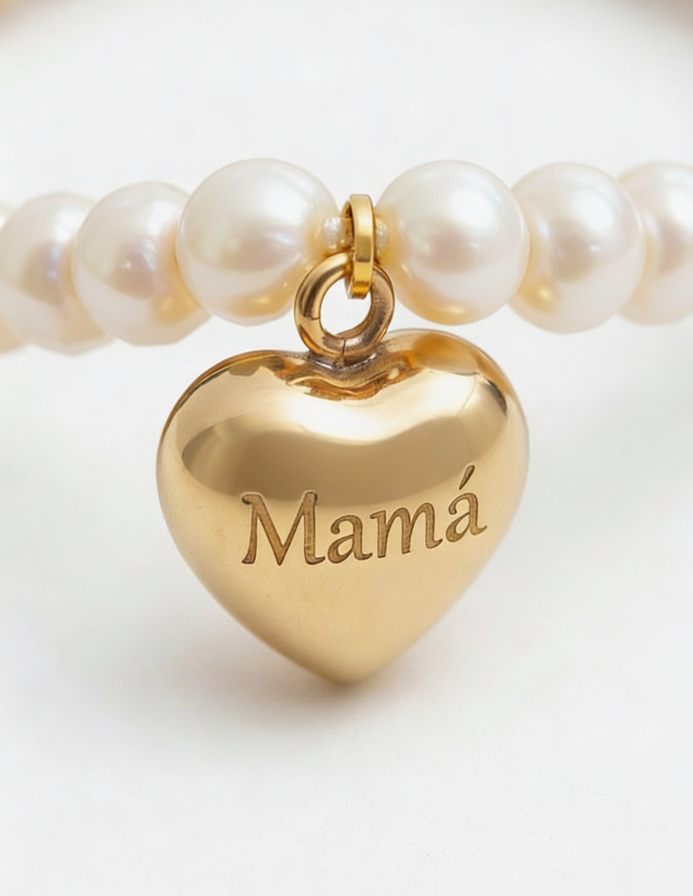 Set de Pulsera de perlas mabe con corazón y broqueles con corazón