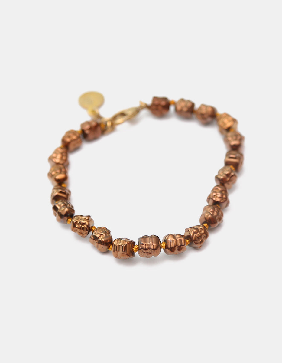 Pulsera de bronce acabado brillante con cabezas de Buda Nordic