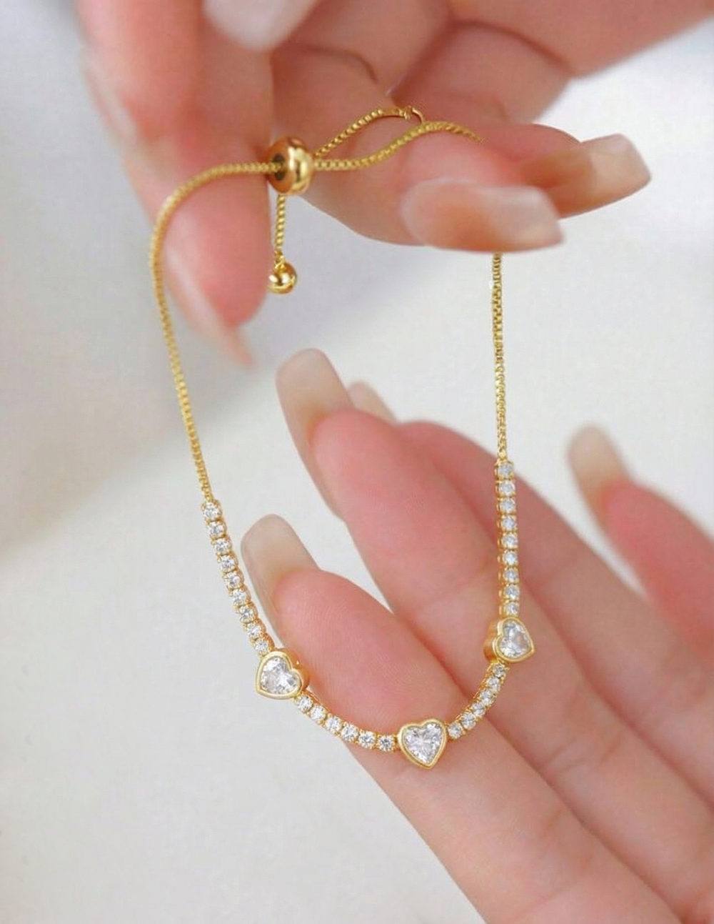 Pulsera ajustable en plata .925 con topacios blancos en corte corazón Love Story