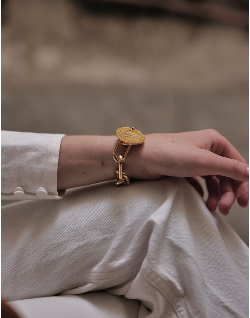 PULSERA MEMORIAS La estética de las monedas vintage crean piezas únicas
